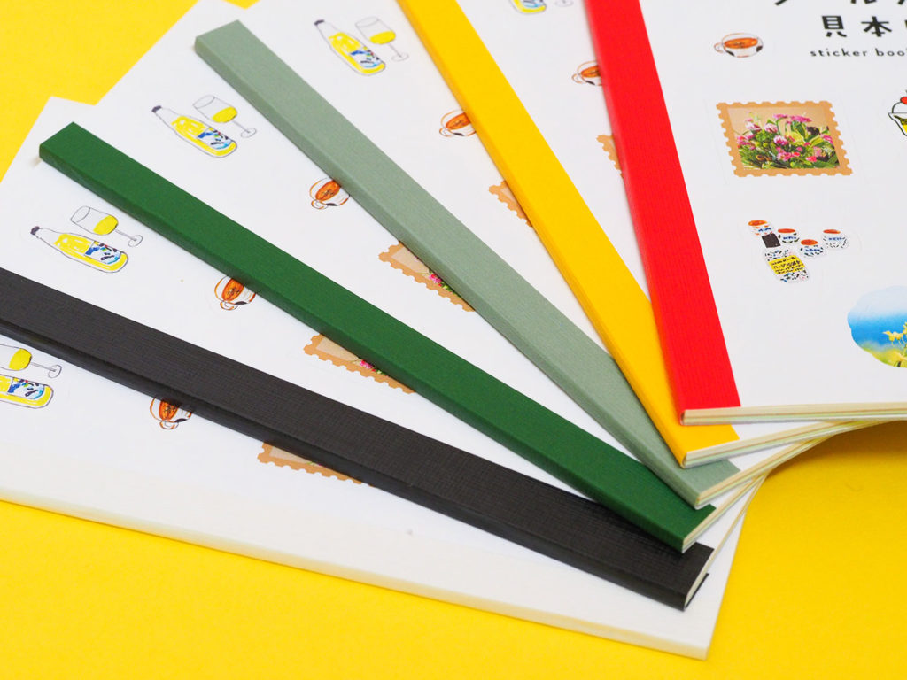 6色の背表紙を並べた写真